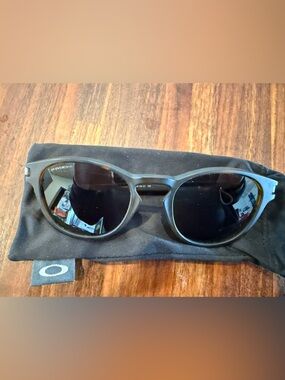 Oakley Latch tortoise color frame. Brown Prizm lens.